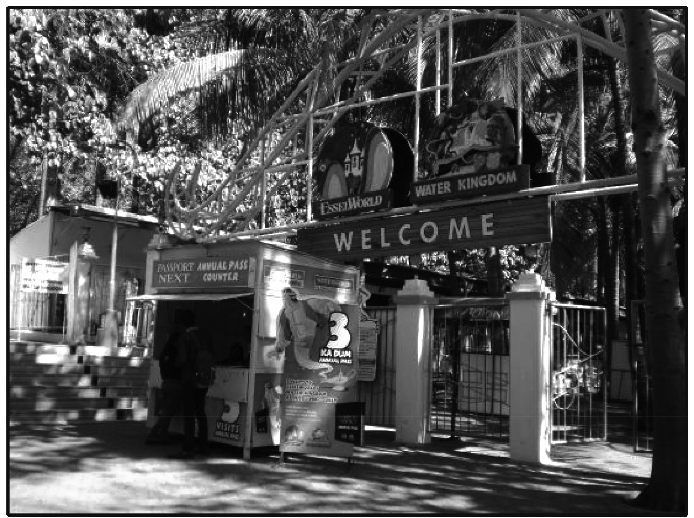 Photograph of the entrance arch and ticket booths at Essel World Water Kingdom park